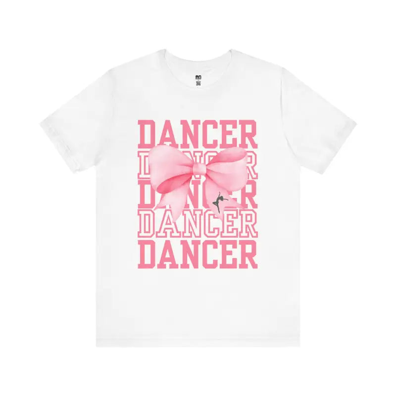 White t-shirt with pink ’DANCER’ text and bow design.