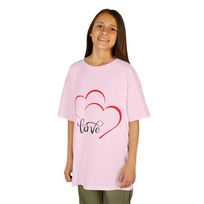 Pink t-shirt with red heart design and ’love’ text graphic.