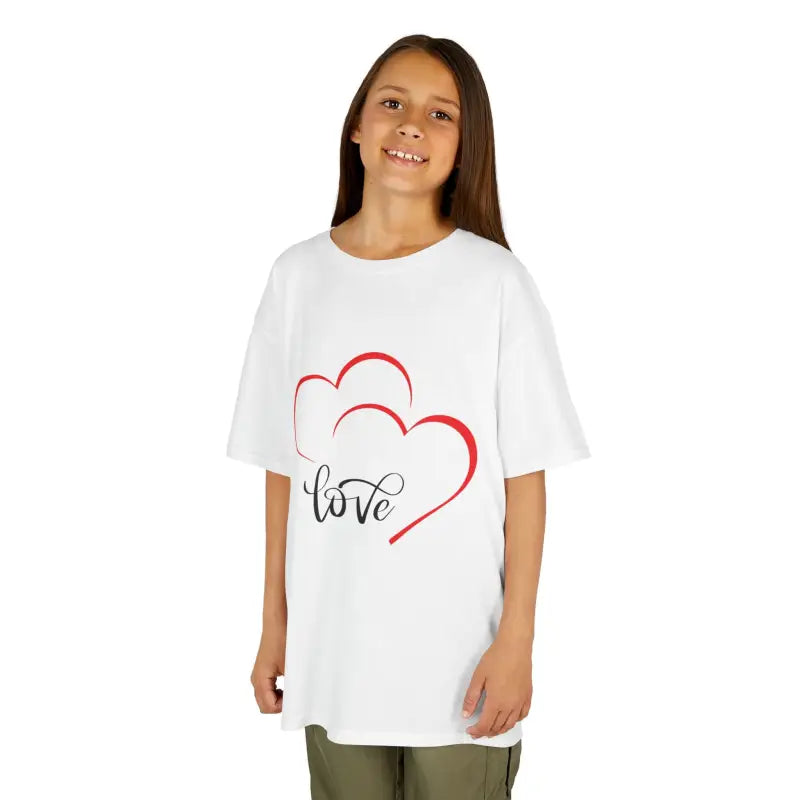 White t-shirt with red heart design and ’love’ text graphic.