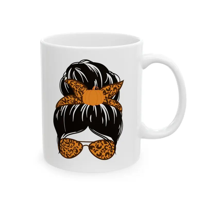 White ceramic mug featuring a messy bun hairstyle design with leopard print bandana and sunglasses.