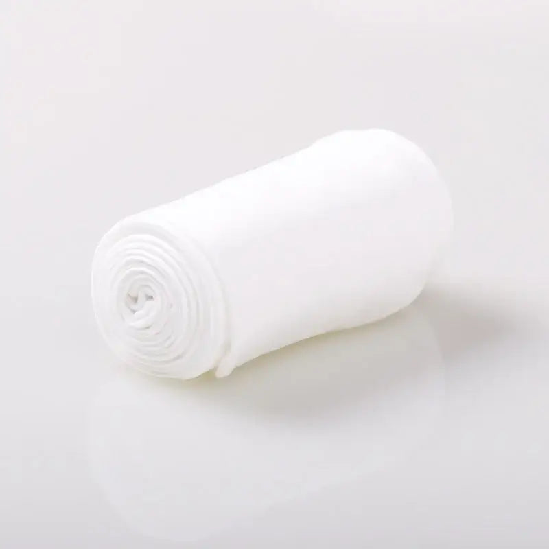 White rolled gauze bandage.
