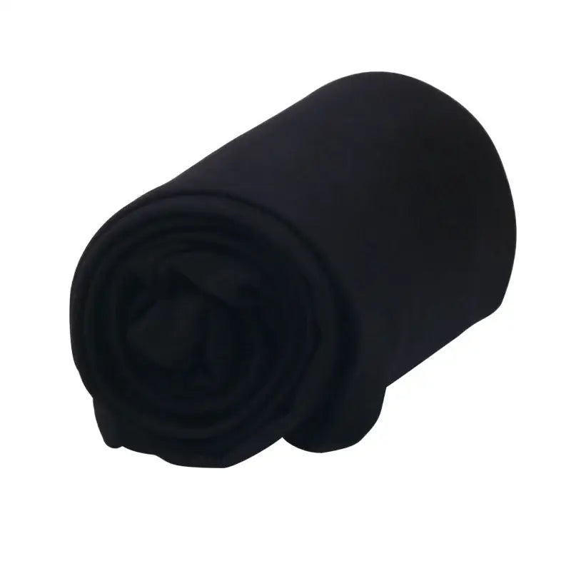Rolled-up black fleece blanket.