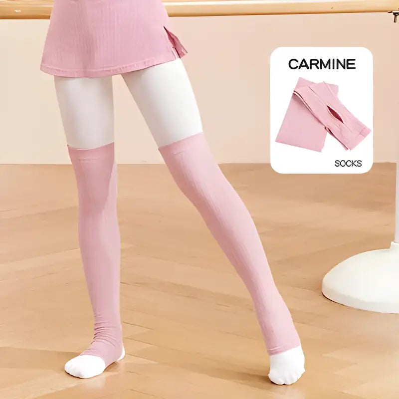 Pink and white color-blocked dance or yoga leggings with stirrups.