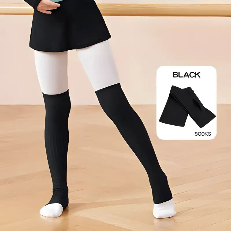 Black and white thigh-high dance leg warmers with contrasting color blocks.