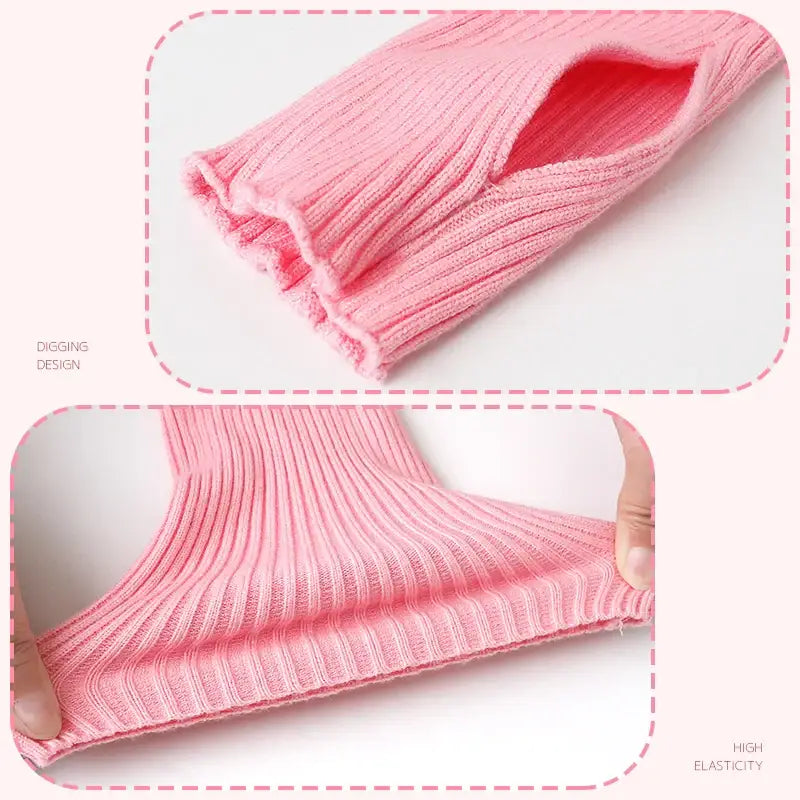 Pink ribbed turtleneck sweater with a folded neckline.