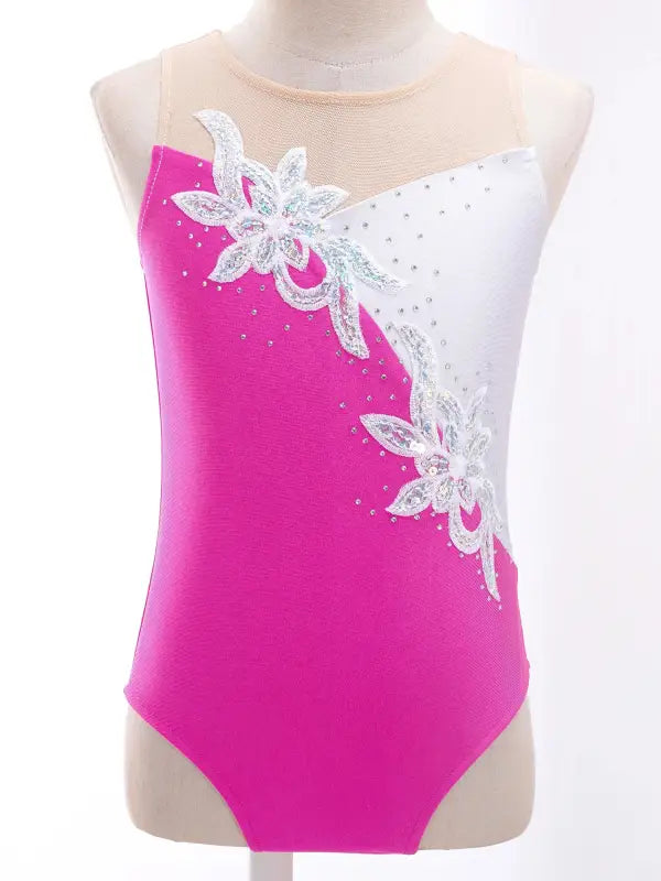 Hot pink gymnastics leotard with white floral lace appliques and rhinestone accents.