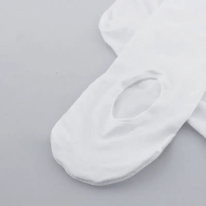 White ballet slipper or dance shoe.