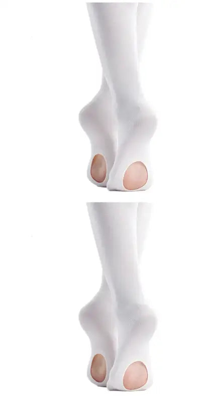 White ballet pointe shoes with holes cut in the soles.