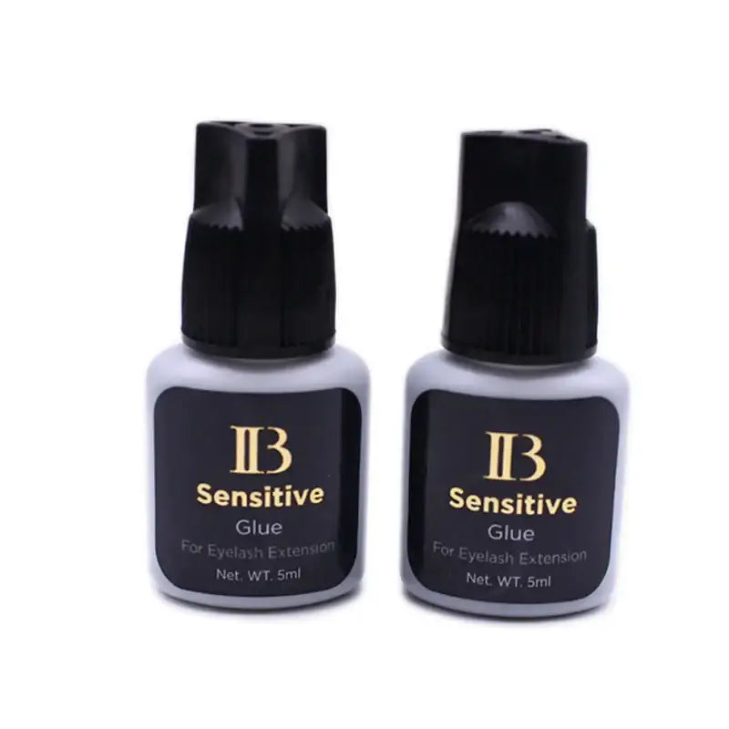 Two bottles of eyelash extension glue.