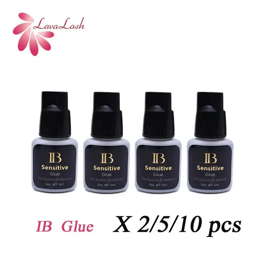 Four bottles of eyelash extension glue.