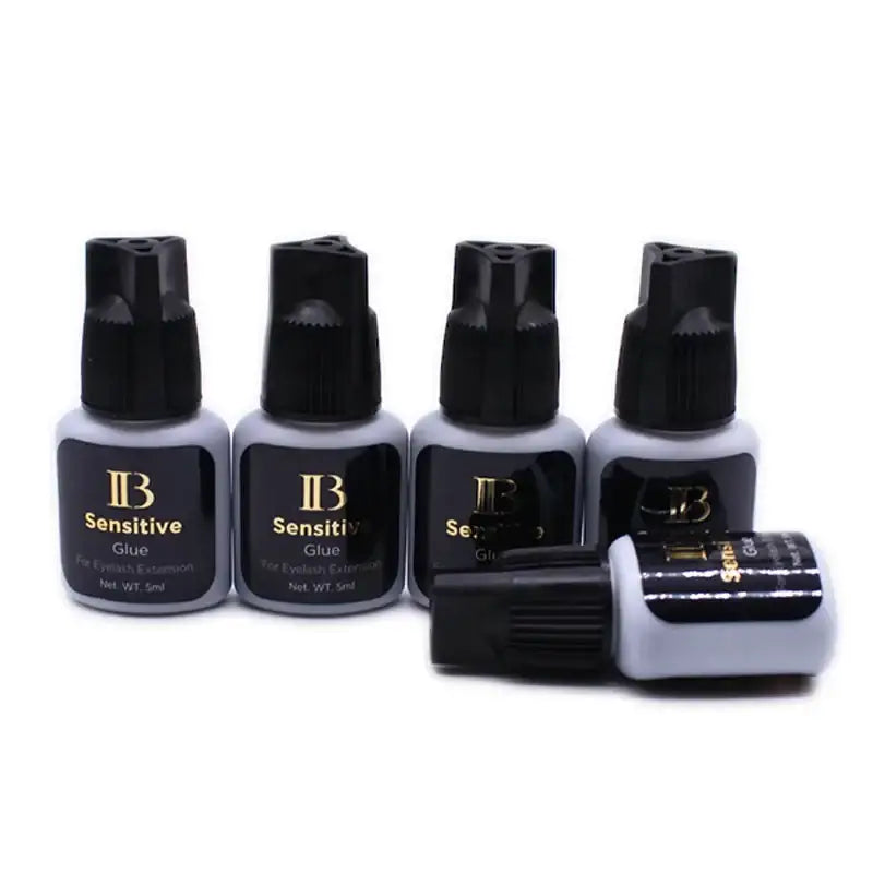 Bottles of eyelash extension glue.