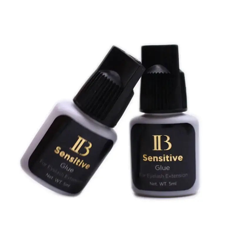 Two bottles of eyelash extension glue.
