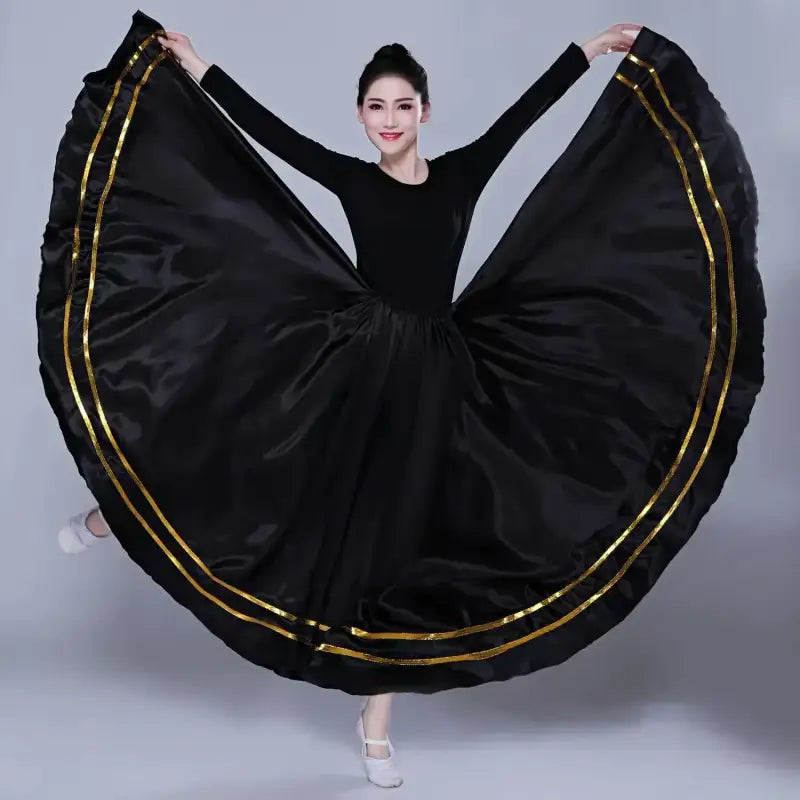 Black dance dress with gold trim.