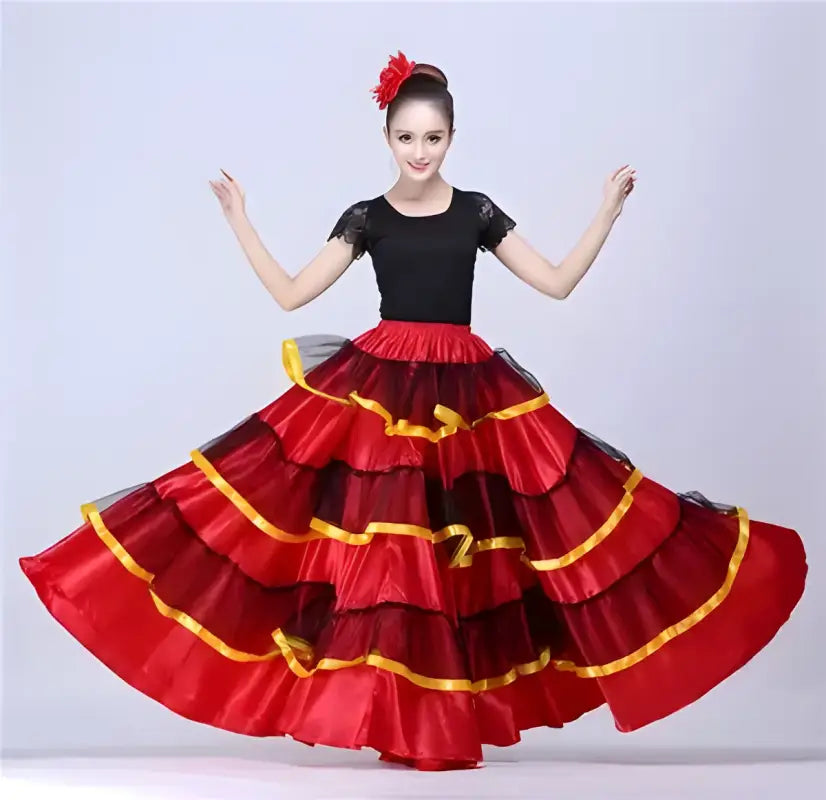 Flamenco dancer in red and black tiered skirt.