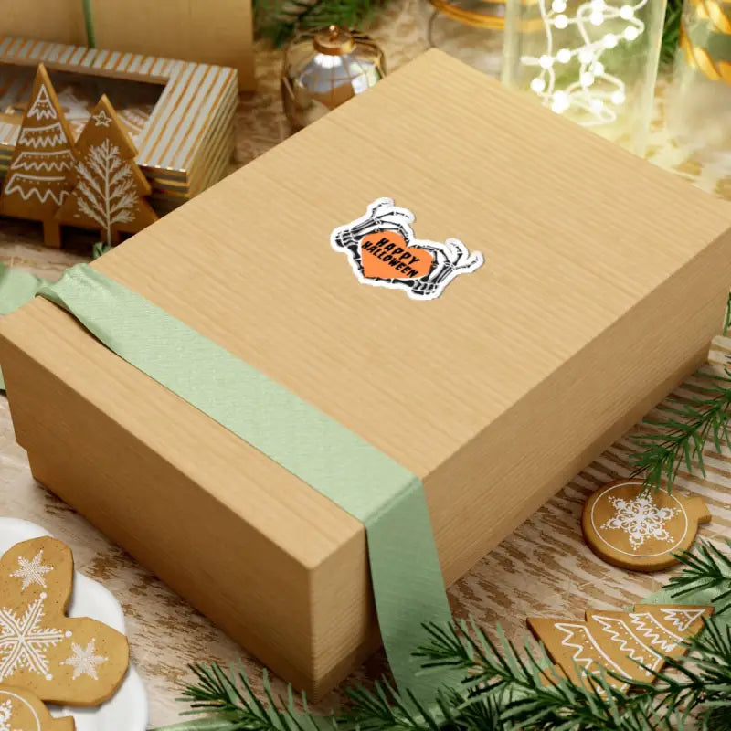 Kraft paper gift box with a mint green band and a sticker decoration.