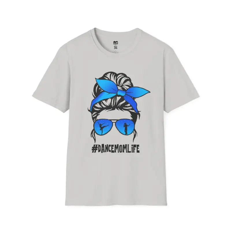 Light gray t-shirt featuring a messy bun hairstyle illustration with blue bandana and sunglasses, accompanied by ’#DANCEMOMLIFE’ text.