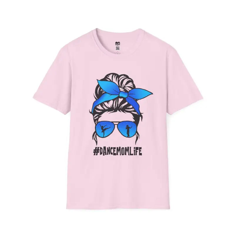 Pink t-shirt featuring a messy bun hairstyle illustration with blue bandana, sunglasses and ’#DANCEMOMLIFE’ text.