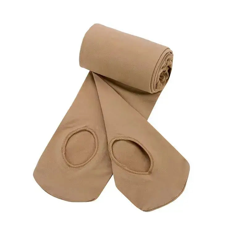 Beige convertible dance tights with holes at the soles.