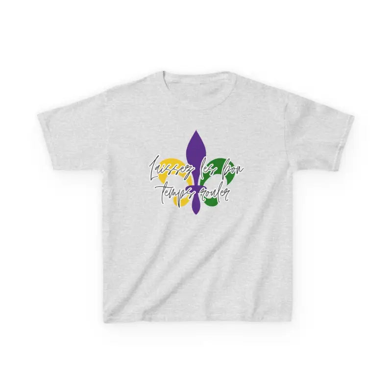 White t-shirt featuring a fleur-de-lis design in purple, green, and gold with text.