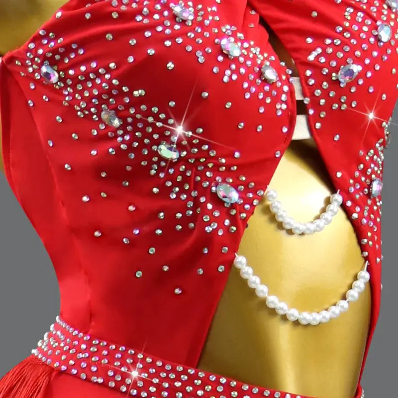 Red dress with rhinestones and pearl accents.