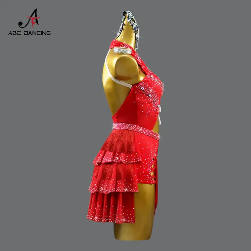 Red, jeweled, fringed dance dress.