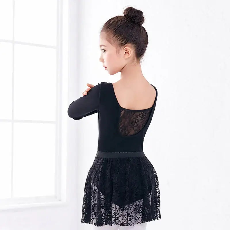 Black ballet leotard with lace skirt and back panel.