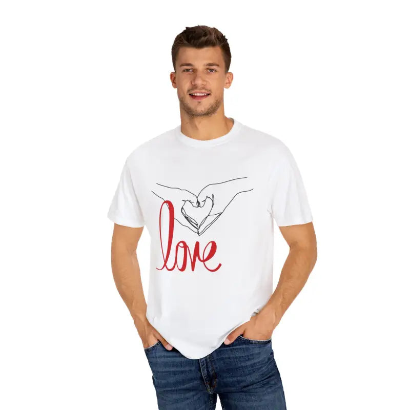 White t-shirt featuring a hand-drawn heart design and ’love’ text graphic.