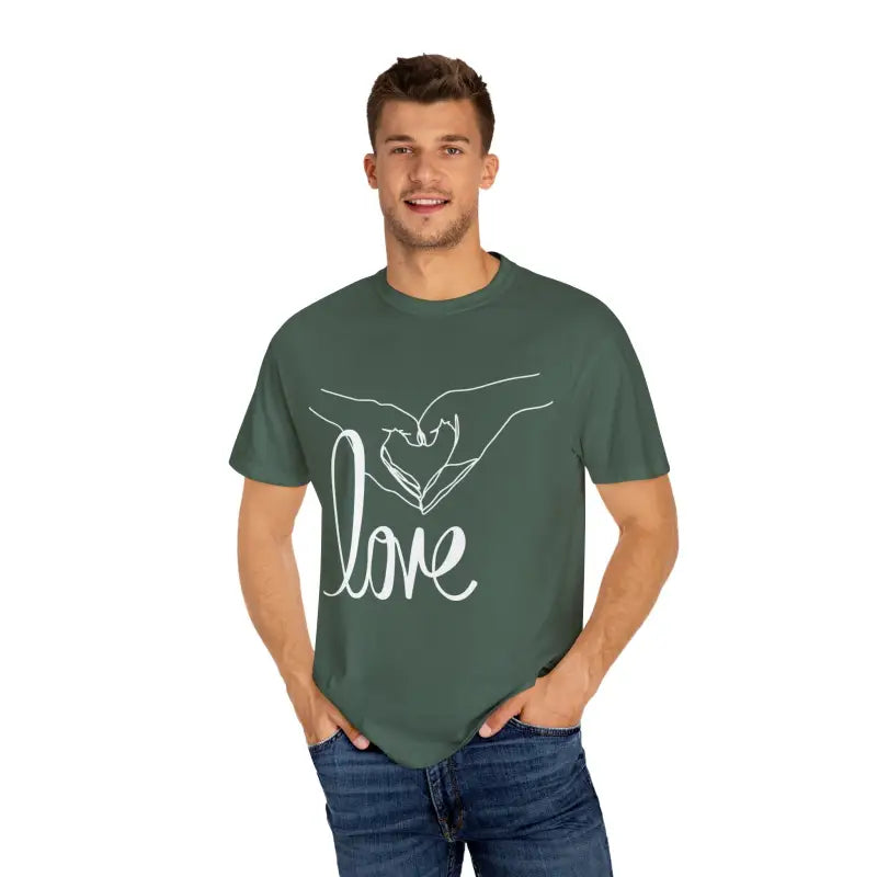 Green t-shirt with white ’love’ text and hand design on the front.