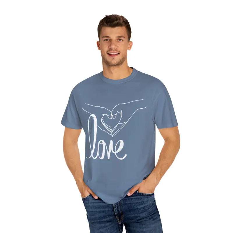 Light blue t-shirt with white ’love’ text and hand design graphic.