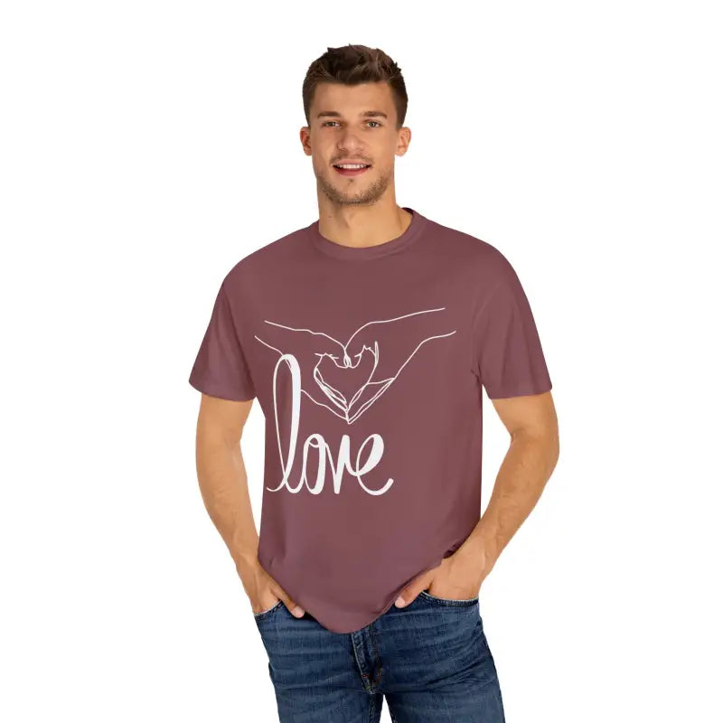 Mauve t-shirt with white hand-drawn heart design and ’love’ text.