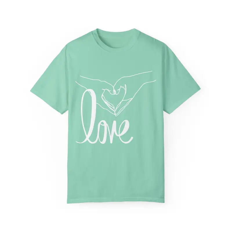 Mint green t-shirt with white ’love’ text and heart hand gesture design.