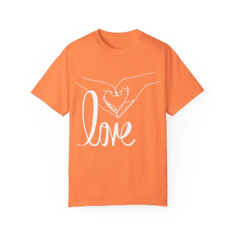 Orange t-shirt with white ’love’ text and hand-drawn heart design.