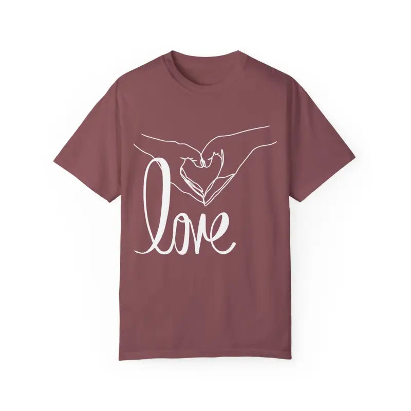 Mauve t-shirt with white hand-drawn heart gesture and ’love’ text design.