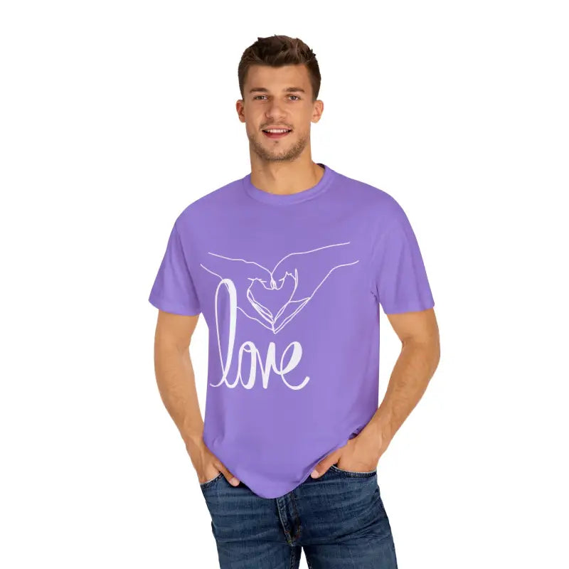 Purple t-shirt with white ’Love’ text and hand design on the front.