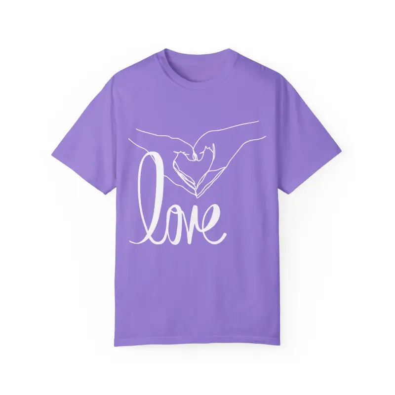 Purple t-shirt with white hands forming a heart shape and ’love’ text design.
