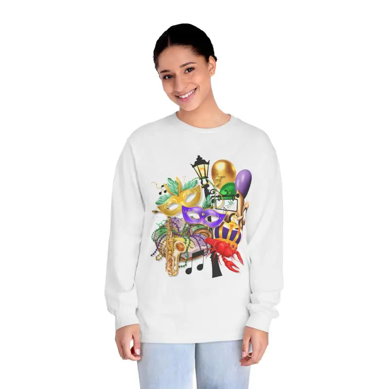 White sweatshirt featuring colorful Mardi Gras themed artwork with masks, musical notes, and festive decorations.