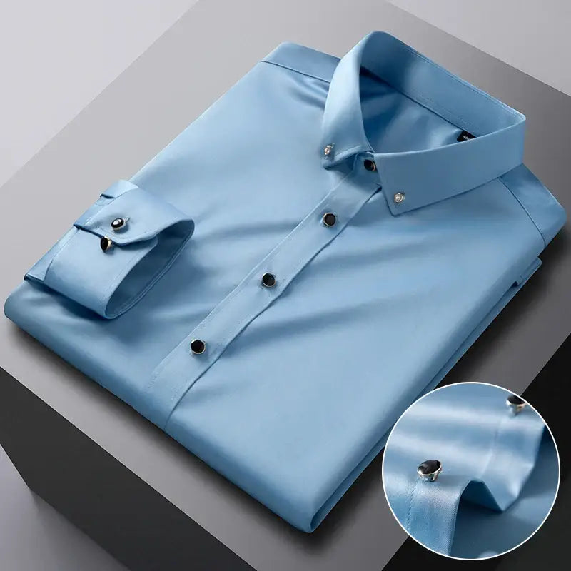 Light blue dress shirt with dark buttons.