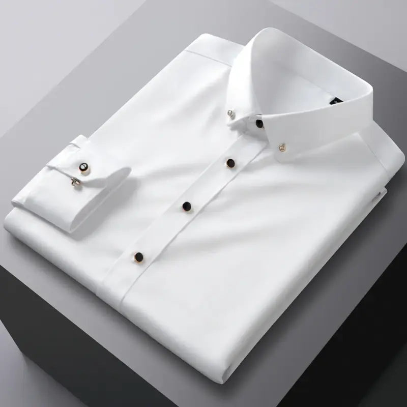 Folded white dress shirt.