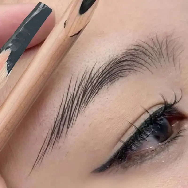 Defined eyebrow with pencil.