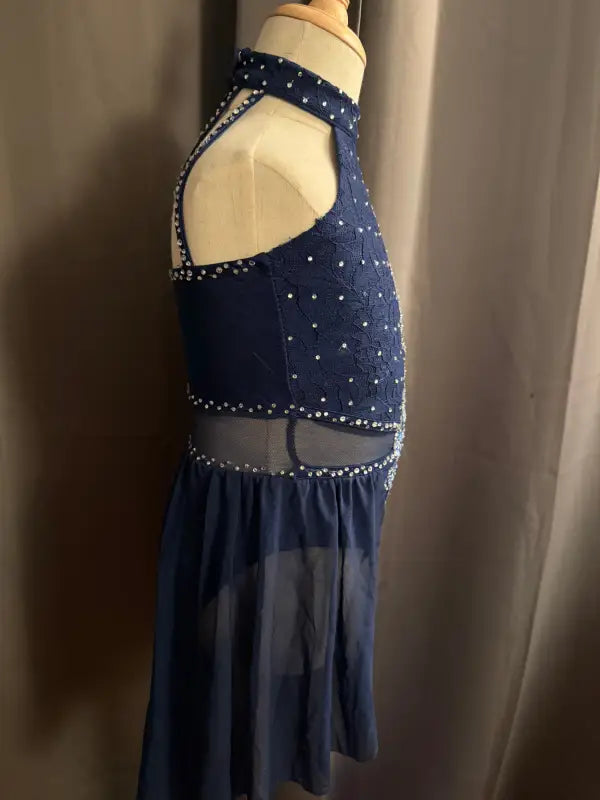 Navy blue dance costume with rhinestones.