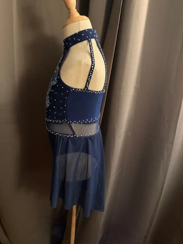 Navy blue dance costume with rhinestones.