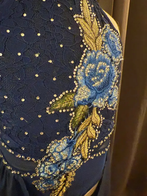 Embroidered blue floral dress.