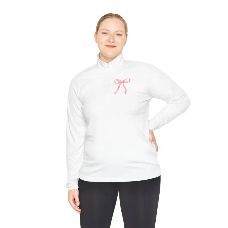 White long-sleeve athletic top with a pink bow design on the chest.