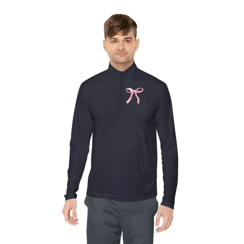 Navy blue mock turtleneck with a pink ribbon accent.