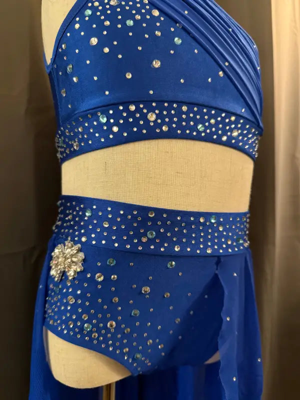 Blue, jeweled dance costume.