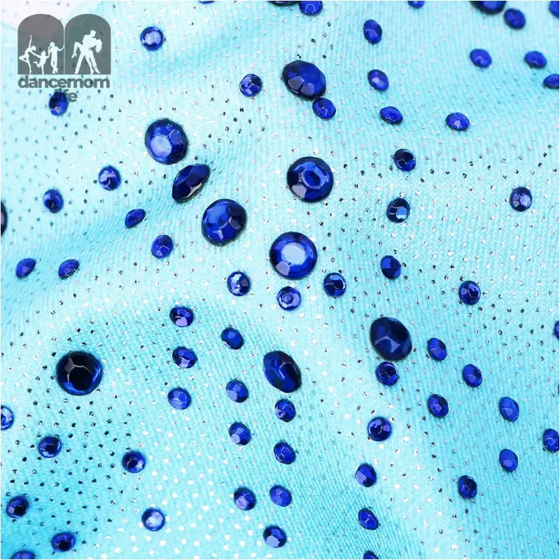Aqua fabric with blue rhinestones.