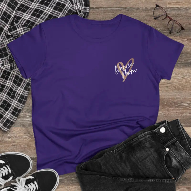 Purple t-shirt with a small metallic design on the chest.
