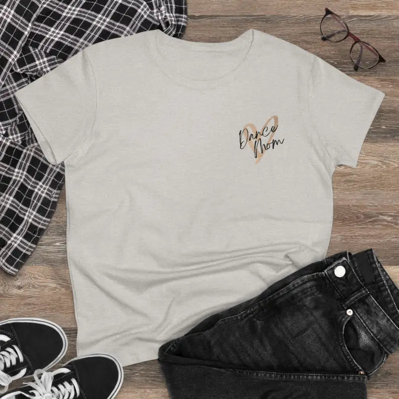 White t-shirt with small gold text detail on the chest.