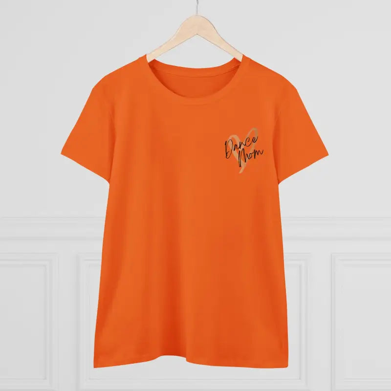 Orange t-shirt with small cursive text on the chest.