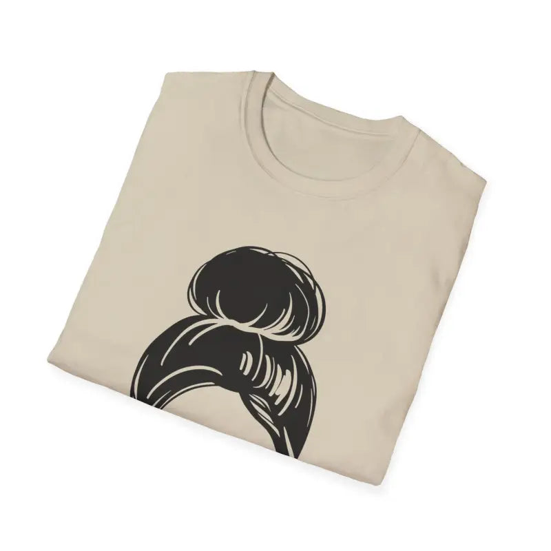 Beige t-shirt featuring a black messy bun hairstyle graphic design.